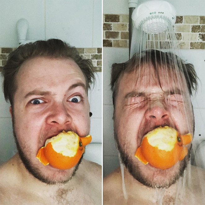 мужчина ест апельсин