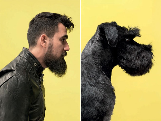 бородатый парень и черная собака