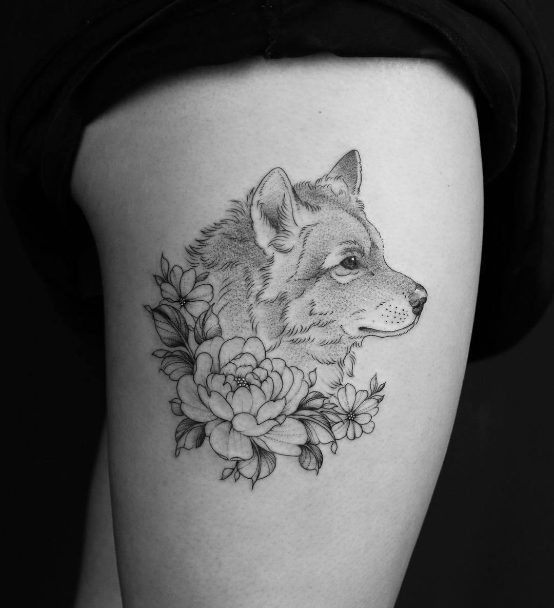 татуировка в виде волка