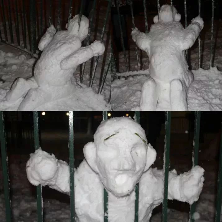 снеговик застрял головой в заборе
