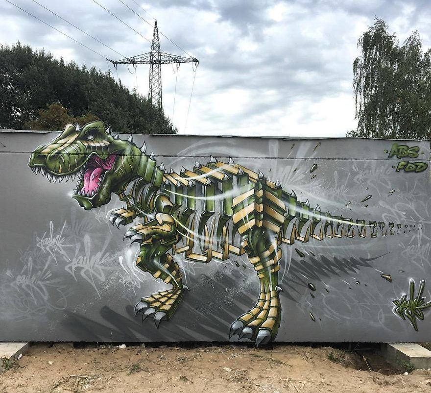 рисунок динозавра на заборе