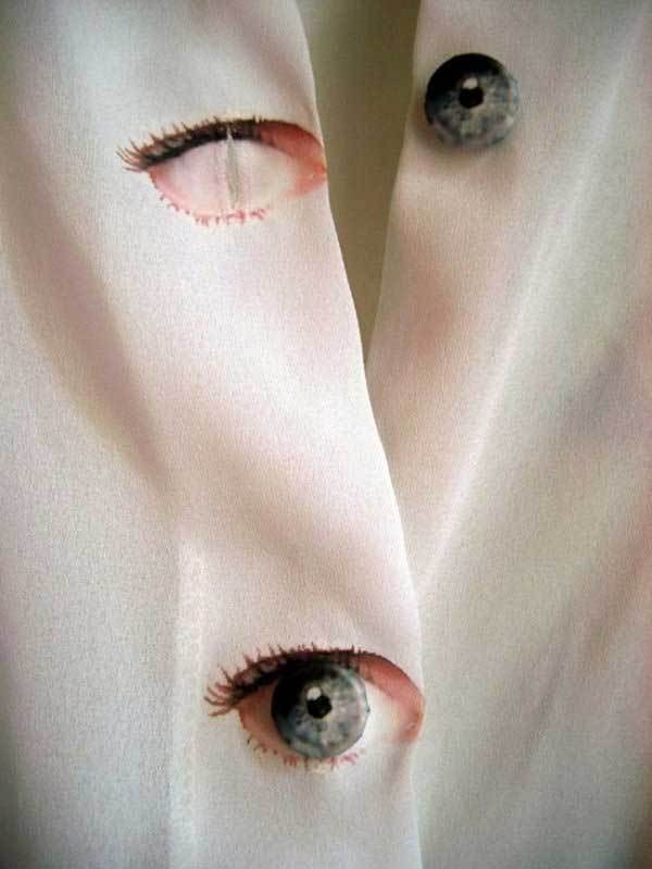 белая блузка с глазами