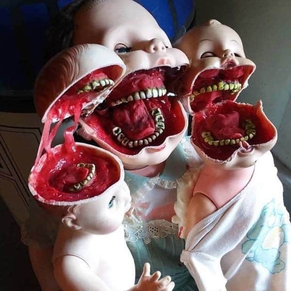 куклы с зубами